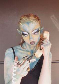 Fantasy makeup, amphibious siren pixie, drag inspired, alien creature, sassy ethereal being, on the phone y2k aesthetic . Sea Monster Halloween Costume, Angler Fish Makeup, Alien Fashion Aesthetic, Alien Drag Makeup, Swamp Monster Makeup, Alien Makeup Aesthetic, Blue Alien Makeup, Drag Creature