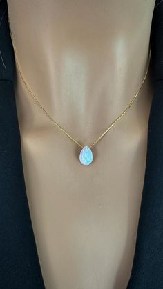 Elevate your style with our breathtaking Teardrop Opal Necklace, a stunning piece that beautifully showcases the iridescent charm of the October birthstone. Perfect for layering or as a minimalist statement, this delicate opal teardrop pendant captures light with every movement, inviting you to embrace its enchanting glow--add it to your collection today and celebrate the magic of opal! Pendant: Lab Opal 8x12mm Chain: 925 Sterling Silver Box Chain, Gold Plated or Rose Gold Plated chain over ster Elegant Faceted Teardrop Crystal Necklaces, Elegant Teardrop Faceted Crystal Necklaces, Elegant Faceted Teardrop Crystal Necklace, Elegant Briolette Faceted Drop Necklace, Elegant Briolette Drop Necklace With Faceted Detail, Elegant Faceted Pear-shaped Necklace, Elegant Pear-shaped Faceted Necklace, Pear-shaped Gemstone Drop Necklace For Wedding, Elegant Faceted Teardrop Drop Necklace