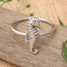 The powerful spirit of the seahorse lives in the stunning details that adorn Anya's newest design. Crafted in the paradisial Balinese lands, this sterling silver cocktail ring features a superb seahorse figure at the front, enriched by a combination of polished and oxidized finishes. Animal Themed Jewelry, Silver Cocktail, Cocktail Jewelry, Animal Rings, Mens Jewelry Necklace, Sterling Silver Dangle Earrings, Themed Jewelry, Balinese, Silver Earrings Dangle