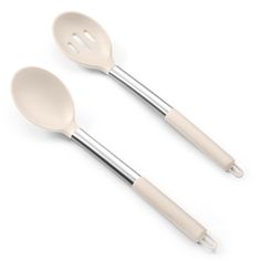 two white utensils with spoons on them