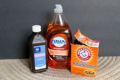 two bottles of dawn baking soda, one with baking soap and the other with baking detergent