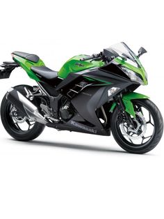 a green and black motorcycle on a white background