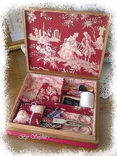 the sewing box has many items in it