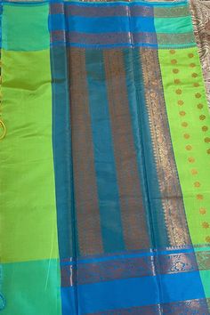 Semi Kanchi silk vibrant green with blue combo butta pattern budget saree for festival. Light weight elegant drape. There may slight color difference due to camera and device. No Pico or Fall  Handpicked saree from southern part of india.  30 days return accepted with no physical damage or draping. Green Cotton Silk Dupatta For Navratri, Green Art Silk Salwar Kameez With Cutdana, Festive Green Cotton Silk Dupatta, Green Cotton Silk Traditional Wear For Navratri, Green Cotton Silk Traditional Wear For Diwali, Green Cotton Silk Salwar Kameez With Zari Work, Green Cotton Silk Traditional Wear For Festivals, Green Salwar Kameez With Cutdana For Festivals, Green Cutdana Salwar Kameez For Festivals