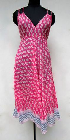 "ITEM DESCRIPTION pink printed cotton long beach wear dress - v neckline with strap boho maxi dress - sleeve less maxi dress Features: sleeve less, V neck, Long dress Material: Cotton Voile Fabric: 100% cotton soft light weight ethnic print fabrics For more sizes & their measurement, please refer our below chart to understand the sizes variations available with us For your size requirement, please mention your size in seller note at the time of buying. SIZE MEASUREMENT BUSTLENGTH XXS34 inch51 in Pink Ikat Print Summer Dress, Summer Pink Ikat Print Dress, Pink Bandhani Print Dress, Traditional Summer Maxi Dress With Ikat Print, Traditional Ikat Print Maxi Dress For Summer, Traditional Summer Maxi Dress With Batik Print, Pink Batik Print Summer Dress, V-neck Block Print Maxi Dress For Summer, Long Beach Wear