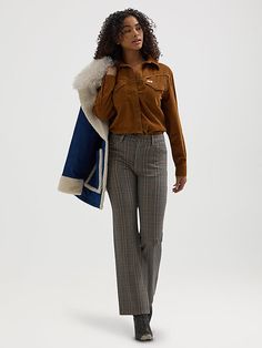 Serving Wild West with a twist, our Women’s Wrancher Plaid Pant can do no wrong. It’s crafted from a comfy cotton blend with just a hint of stretch. This bold take on our iconic bootcut features a mid-rise waist, a fitted silhouette through the seat, a straight leg through the knee, and a leg opening made with boots in mind. You thought the five-pocket styling, “W" stitching, logo patch, and branded hardware were nice, but the fun plaid pattern is the icing on the cake. Cotton Bottoms With Pockets For Rodeo, Cotton Straight Leg Bottoms For Rodeo, Western Style Brown Bottoms For Fall, Western Style Cotton Straight Leg Bottoms, Western Style Straight Leg Cotton Bottoms, Western Style Cotton Bottoms For Fall, Casual Bottoms For Ranch In Fall, Fitted Bottoms For Rodeo In Fall, Western Style Relaxed Fit Straight Leg Bottoms