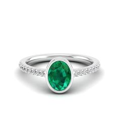 14K White Gold Oval Emerald Birthstone Ring In Fine Jewelry Style, Green Emerald Diamond Ring With Pave Setting, Oval Emerald Rings With Pave Setting, Oval Emerald Ring With Pave Setting For Anniversary, Oval Emerald Ring With Pave Diamond Setting, Oval Emerald Ring With Diamond Pave Setting, Oval Emerald Ring With Pave Setting, Oval Emerald Ring With Pave Setting For Formal Occasions, Emerald Ring With Pave Setting For May Birthstone Anniversary