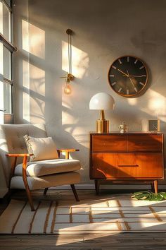 a living room with a large clock on the wall and two chairs in front of it