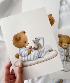 two cards with teddy bears on them, one is holding a stuffed animal and the other has a baby's diaper