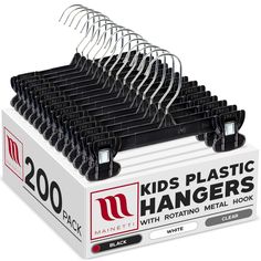 a bunch of black plastic hangers in a box