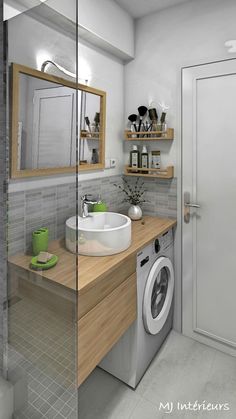 a washer and dryer in a small bathroom