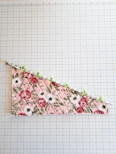 a piece of fabric with flowers on it