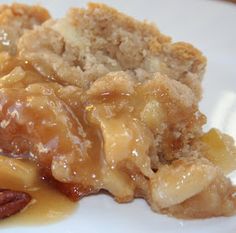 a close up of a plate of food with bread and fruit toppings on it