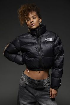 The iconic The North Face 1996 Retro Nuptse down puffer jacket made modern in a cropped puffer jacket silhouette. The North Face Nuptse short down puffer jacket is crafted from durable water-repellent recycled nylon with ultra-warm 700 down fill in a cropped boxy puffer jacket silhouette. Finished with an adjustable drawcord hem and zip-front closure. This cozy puffer jacket has an attached stowable hood, and zipped hand pockets. Features The North Face Nuptse short jacket Cropped version of the The North Face Cropped Jacket, Cropped North Face Jacket, North Face Cropped Puffer, Cropped Puffer Jacket Outfit, North Face Puffer Jacket Outfit, Crop Puffer Jacket, Jacket Silhouette, The North Face 1996 Retro Nuptse, Sew Ideas