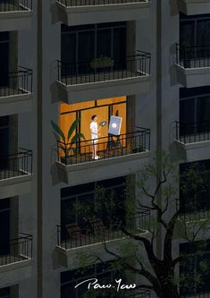 a man standing on the balcony of an apartment building