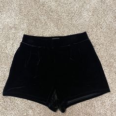 Black High-Waisted Velvet Shorts From Express. Never Worn High Waist Bottoms With Built-in Shorts For Date Night, High Rise Bottoms With Built-in Shorts For Night Out, Black Bottoms With Built-in Shorts For Going Out, Fitted Shorts With Elastic Waistband For Night Out, Black High-waisted Shorts For Going Out, High Rise Stretch Shorts For Night Out, Stretch High Rise Shorts For Night Out, Casual Party Bottoms With Short Inseam, High Rise Casual Bottoms For Date Night