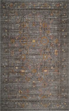 an area rug with many different colors and patterns on the carpet, including greys, browns