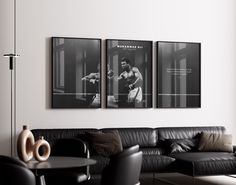 two black and white pictures hanging on the wall above a couch in a living room