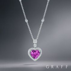 A Dynamic Liaison - The stunning pink sapphire provides a striking contrast to the finest diamonds in this dazzling pendant. A scintillating halo of diamonds traces the silhouette of a heart shape sapphire, showcasing a design that is destined to become an ultimate gesture of love #GraffDiamonds #Heart #Love #Sapphire #FineJewellery #HighJewellery #Diamonds #OneOfAKind #ValentinesDay #WishList Pink Sapphire Jewelry, Solid Necklace, Sapphire Diamond Pendant, Heart Shaped Jewelry, Heart Shaped Diamond, Heart Gemstone, Pink Jewelry