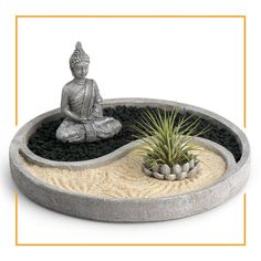 a buddha statue sitting on top of a cement bowl filled with plants and gravel in front of a white background