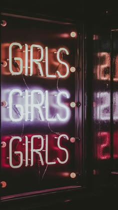 a neon sign with the words girls and boys written on it