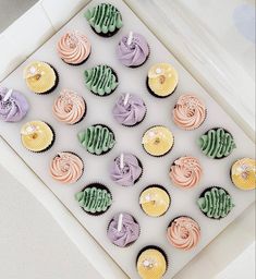 cupcakes are arranged in the shape of spirals