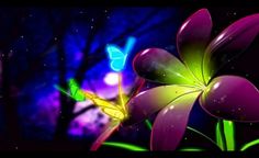 a flower with two butterflies on it in front of some trees and blue light up lights