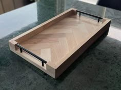 a wooden tray sitting on top of a table