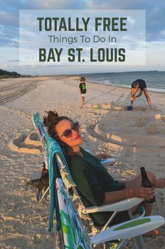 a woman sitting in a lawn chair on the beach with text overlay that reads totally free things to do in bay st louis