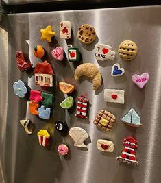 the magnets on the refrigerator are made to look like food