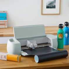 an image of a printer and other items on a table