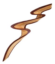 a curved wooden object on a white background