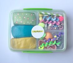 a plastic container filled with lots of different items