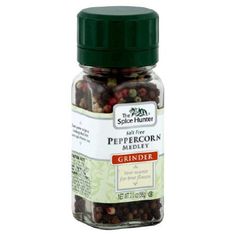 the spice hunter peppercorn mix is in a glass jar on a white background