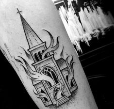 a black and white photo of a tattoo with a clock tower in the middle of it