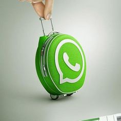 a person pulling a green suitcase with the word whatsapp on it and an ad for whatsapp