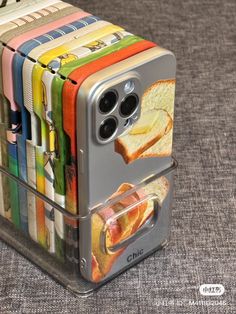 a stack of toasted bread and colorful crayons in a holder on a table