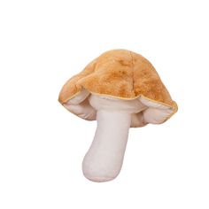 a mushroom stuffed animal sitting on top of a white surface