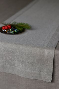 a close up of a table with a cloth on it