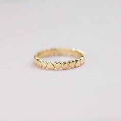 A heart eternity ring made of 14K solid gold. The ring is a heart band, so delicate and dainty that you will wear it forever. It can also be used as a simple wedding band or a thumb ring. This gold ring for women is ideal to be stacking, so you can make your own style. The best gift for her by Kyklos Jewelry. 100% handcrafted with love! ● Metal: 14K solid gold, 14K white gold  ● Width: 2.5 mm ● Choose from the drop down menus the available options (Metal, Ring size) and leave us a note for any special requirements. ● All our pieces are delivered beautifully packaged and gift ready.  ● Please keep in mind that each item is handcrafted and we need 5-7 days at least for its production. If you need your order on a specific date, please contact us. ● All orders are shipped worldwide via FedEx E Heart Wedding Band, Gold Thumb Ring, Thumb Rings For Women, Heart Eternity Ring, Heart Infinity Ring, Simple Gold Ring, Gold Thumb Rings, Simple Wedding Bands, Stacked Wedding Bands