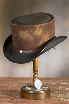 The Hatlas is handcrafted of premium leather that’s laser engraved and airbrushed with an antique copper tone finish of yesteryear. Free shipping   returns. Steampunk Hats, Mini Top Hats, Leather Top Hat, Steampunk Top Hat, Business Travel Bag, Social Calendar, Derby Hats Fascinators, Steampunk Hat, Mini Top Hat