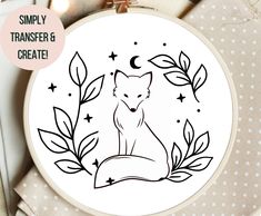 an embroidery pattern with a fox sitting on top of it and the words simply transferer & create