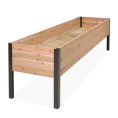 a wooden planter with metal legs on an isolated white background