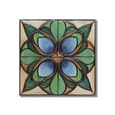 an art nouveau design with blue and green leaves