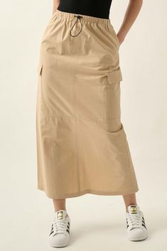 Solid twill maxi skirt. Elastic waist with toggle drawsting. Hip pockets. Side flap cargo pockets. Back slit. Ankle length. Relaxed fit. 100% Cotton. Imported. Designed in LA. Model wears size S. Pocket Skirt Outfit, Maxi Cargo Skirt, Beige Midi Skirt, Pace Yourself, Simple Summer Style, Workwear Brands, Twill Skirt, Long Denim Skirt, Muslim Fashion Outfits