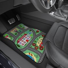 a car floor mat with cars on the road