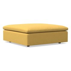 a yellow footstool sitting on top of a white floor