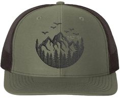 PRICES MAY VARY. Built on Richardson 112 Trucker Hat Mid-Profile cap High Air-Flow Mesh Back. Great for warm weather! Artfully Embroidered Hats with Mountain Edition Artwork Cotton-Poly/Nylon Mesh Fabric PERFECT GIFT for the hunter, fisherman, or all around outdoorsman in your life. Great birthday gift, Christmas present, stocking stuffer, fathers day gift, or anniversary gift. High quality Richardson 112 Trucker hat. Structured, mid-profile, six-panel cap with snapback fitting. Artfully embroid Mountain Hat, Outdoor Hat, Fishing Gift, Hunting Gifts, Outdoor Hats, Embroidered Caps, Fishing Gifts, Embroidered Hats, Great Birthday Gifts