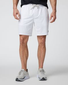 One short for every sport, the Kore Shorts have a classic athletic fit, falling just above the knee with an anywhere and everywhere versatility. Go commando in confidence with the breathable, boxer-brief liner. | Vuori Kore Shorts | White | XS Vuori makes premium performance apparel inspired by the active Coastal California lifestyle; an integration of fitness, surf, sport, and art. Breaking down the boundaries of traditional activewear, we are a new perspective on performance apparel. White Athleisure Shorts With Go-dry Technology, White Go-dry Athleisure Shorts, White Athletic Shorts With 4-way Stretch For Sports, White 4-way Stretch Athletic Shorts For Sports, White Go-dry Sports Shorts, Functional White Moisture-wicking Shorts, Functional White Go-dry Shorts, White Athletic Shorts With 4-way Stretch For Training, White Athletic Shorts For Training With 4-way Stretch