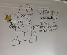 a drawing of a wizard holding a wand and pointing to the stars on the board